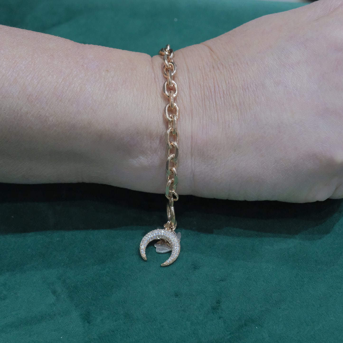 Bracciale in acciaio con ciondoli e zirconi